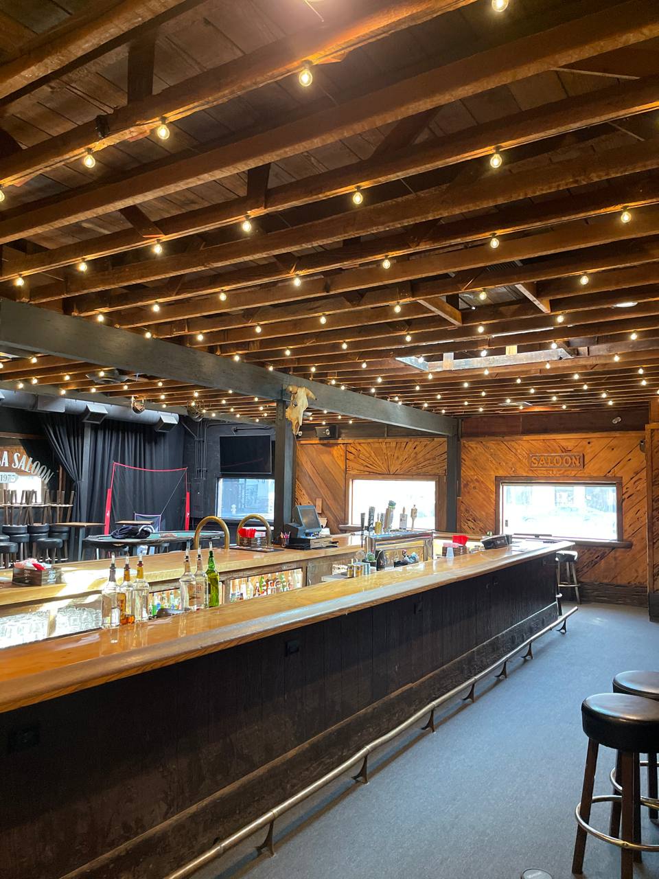 The long indoor bar at The Hermosa Saloon