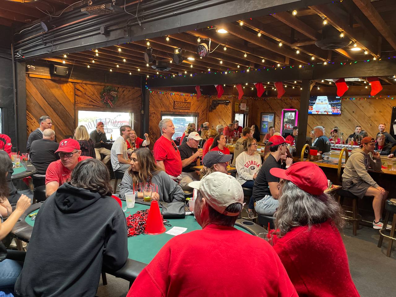 Georgia fans filling The Hermosa Saloon for a sports watch party